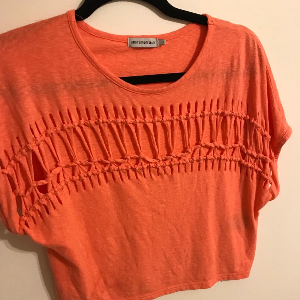 A orange top from urban outfitters